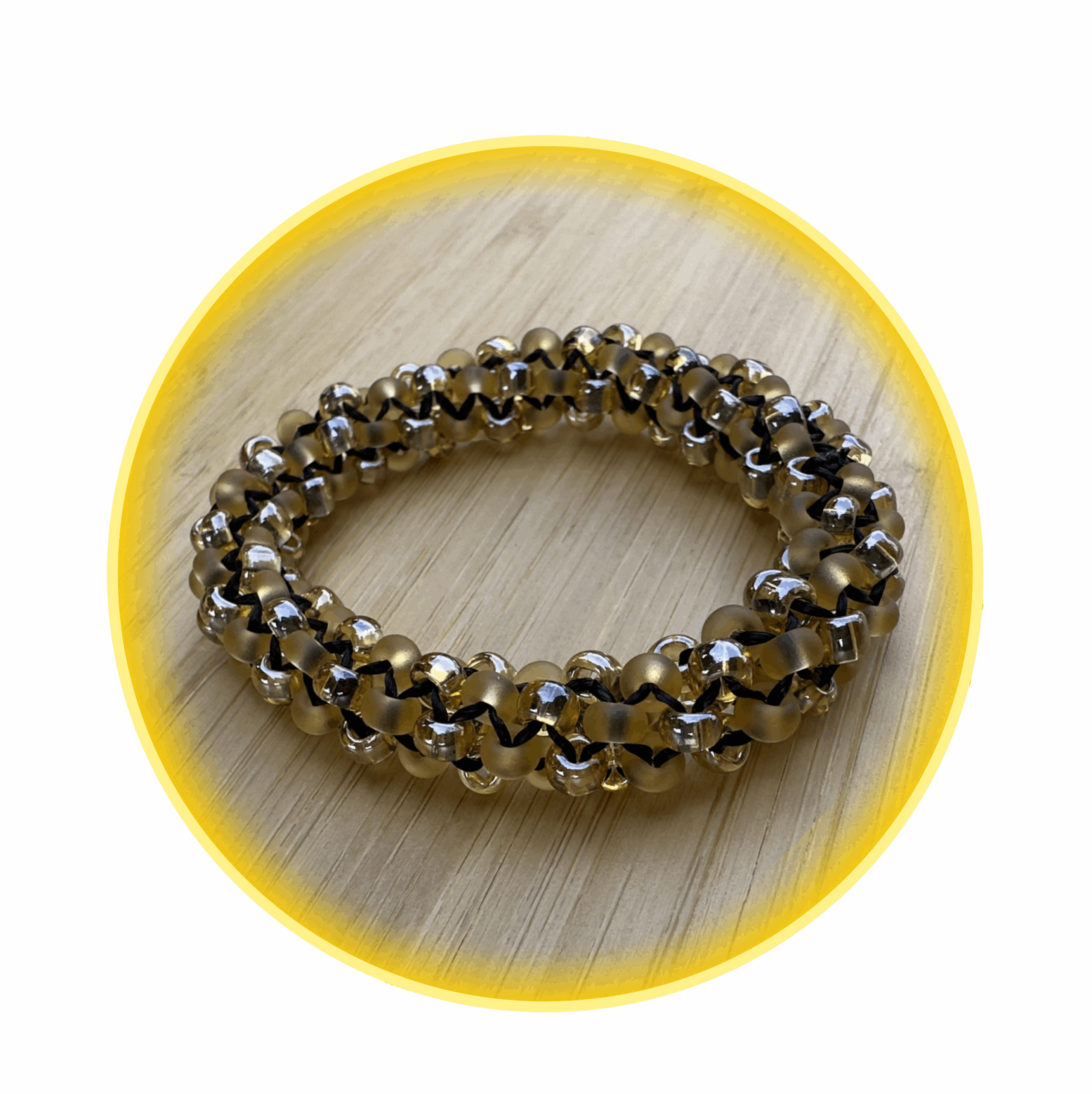 011 hodná gumička zlato černá