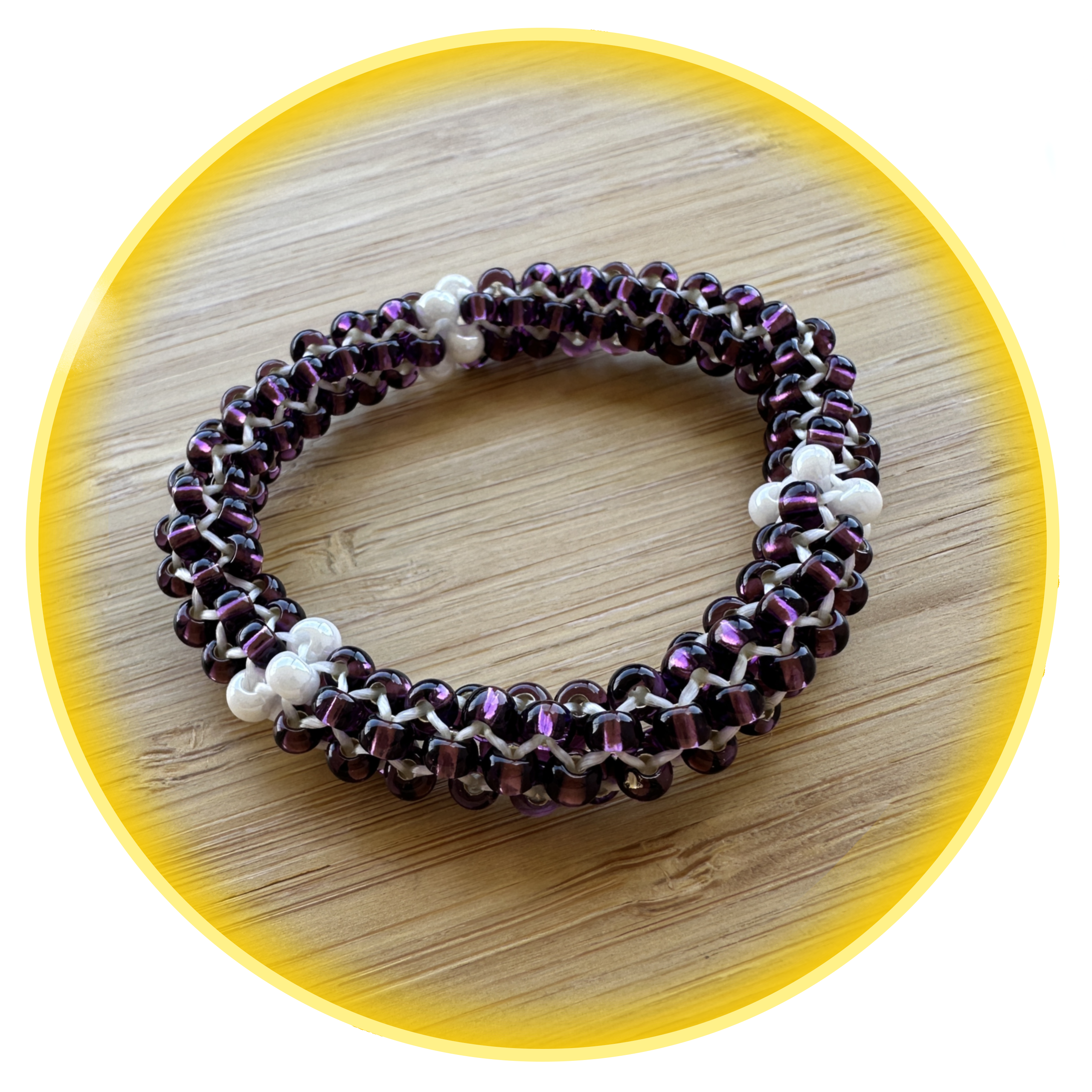 053 hodná gumička fialovo bílá